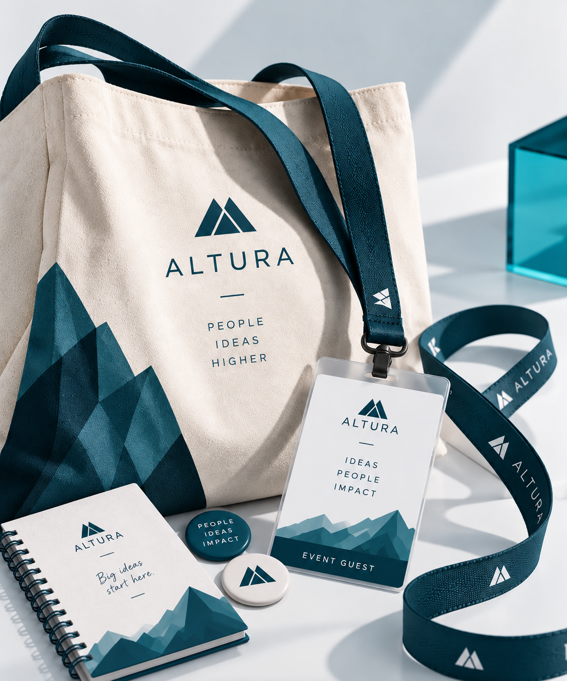 Shopper in tela, badge con lanyard, notebook e pin coordinati con logo Altura per un evento aziendale